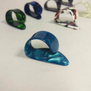 Púas para dedo pulgar de guitarra